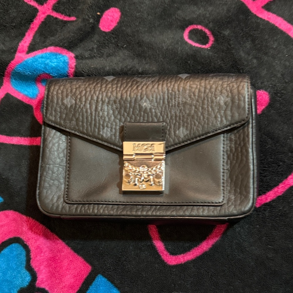 Elegant Black Leather Clutch with Gold Accent